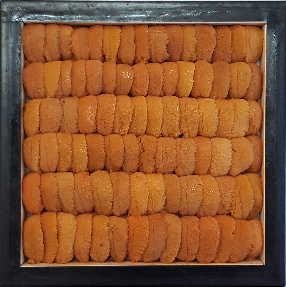 This brand of premium uni, Seto-Matsu Ura, is the most premium farmed bafun uni available and is specially chosen by the owner of the uni farm every morning after their uni is shucked and prepared for packing.